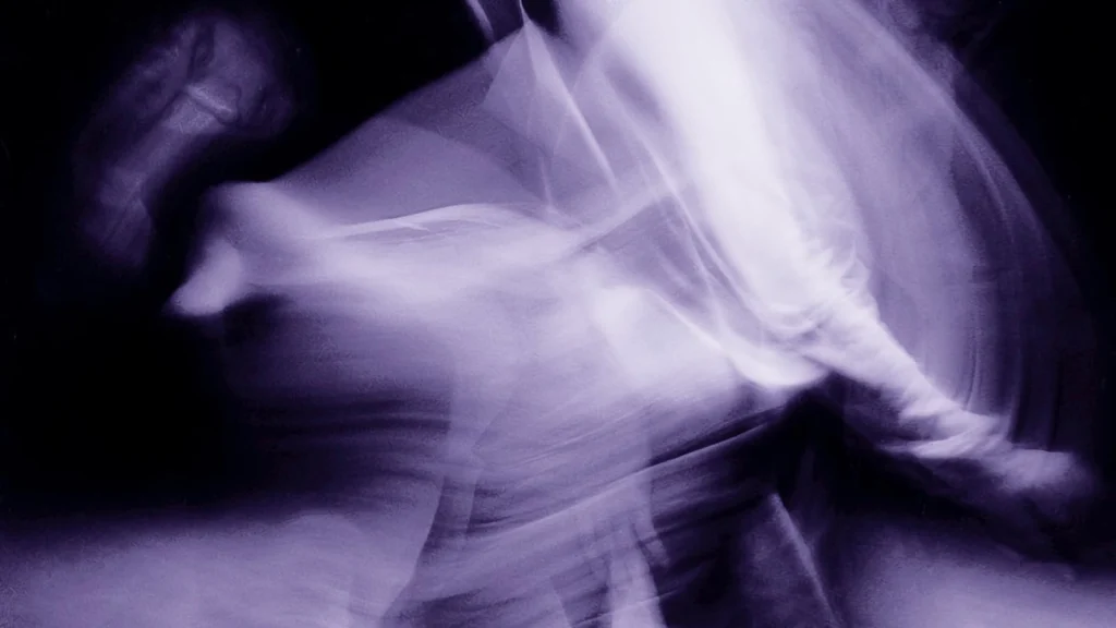 Blurred long-exposure image of a dancer in motion