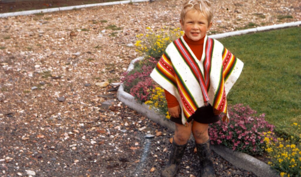 Malcolm Manning in poncho. May 1968